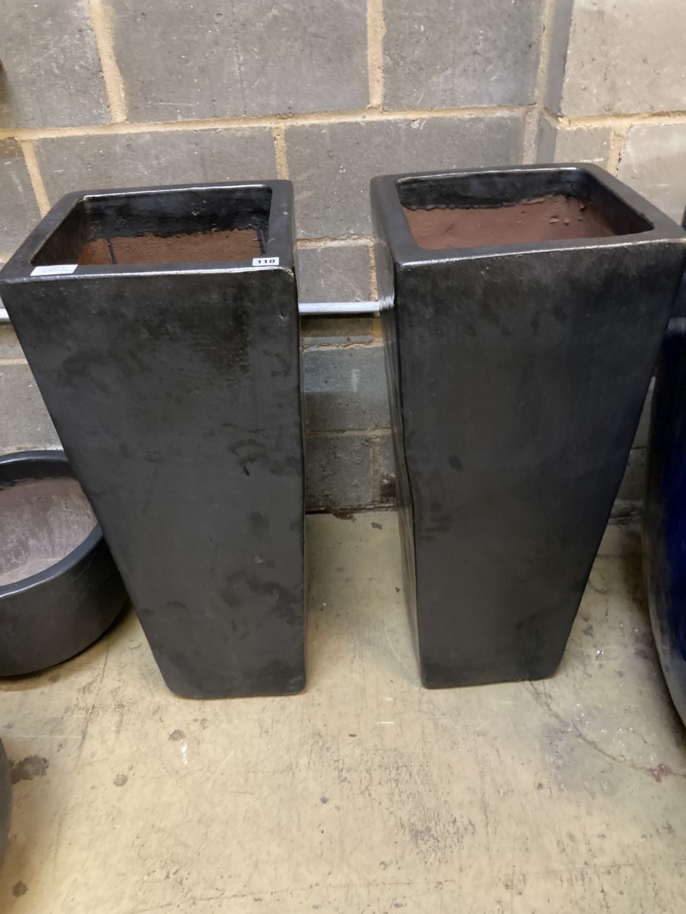 A pair of tall glazed garden planters, width 36cm, height 89cm